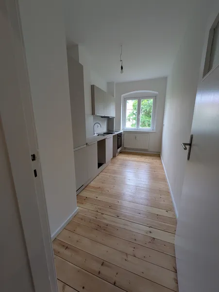 Erstbezug: 2 Zimmer Wohnung mit Balkon und Einbauküche im Herzen von Weißensee zu vermieten! — photo 1